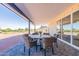 Covered patio with seating area and mountain views at 3939 S Veronica Ln, Gold Canyon, AZ 85118