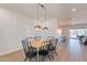 Open dining area with a view into the kitchen and living areas at 3939 S Veronica Ln, Gold Canyon, AZ 85118