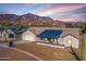 Stunning aerial view of a single-story home with mountain views at 3939 S Veronica Ln, Gold Canyon, AZ 85118