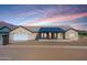 Modern house exterior with a covered porch and mountain views at 3939 S Veronica Ln, Gold Canyon, AZ 85118