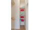 Bright closet with shelves for folded clothes and hanging clothes at 3939 S Veronica Ln, Gold Canyon, AZ 85118