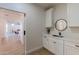 Bright laundry room with sink and access to main bedroom at 3939 S Veronica Ln, Gold Canyon, AZ 85118