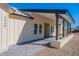 Modern house exterior with a covered porch and mountain views at 3939 S Veronica Ln, Gold Canyon, AZ 85118