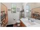 Clean bathroom with shower/tub combo, vanity, and toilet at 10737 E Simone Ave, Mesa, AZ 85212