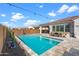 Relaxing backyard with a refreshing pool and comfortable seating at 10737 E Simone Ave, Mesa, AZ 85212