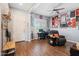 Entryway with built-in bench, hardwood floors, and storage at 10737 E Simone Ave, Mesa, AZ 85212