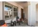 Front porch with seating and autumnal decor at 10737 E Simone Ave, Mesa, AZ 85212