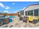 Spacious backyard with a sparkling pool and patio furniture at 10737 E Simone Ave, Mesa, AZ 85212