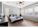Main bedroom with wood floors and plenty of natural light at 10737 E Simone Ave, Mesa, AZ 85212