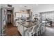 Spacious kitchen with granite countertops, island, and stainless steel appliances at 10737 E Simone Ave, Mesa, AZ 85212