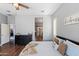 Spacious bedroom with dresser and access to bathroom at 10737 E Simone Ave, Mesa, AZ 85212