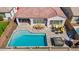 Aerial view of house with pool and patio at 10737 E Simone Ave, Mesa, AZ 85212