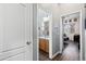 Bright hallway with access to bathroom and bedroom at 10737 E Simone Ave, Mesa, AZ 85212
