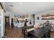 Kitchen and dining area with hardwood floors and access to backyard at 10737 E Simone Ave, Mesa, AZ 85212