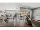 Open concept living room with a view of the pool and kitchen at 10737 E Simone Ave, Mesa, AZ 85212