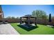 Patio furniture under covered structure at 16543 W Alameda Rd, Surprise, AZ 85387