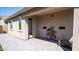 Covered patio with pavers and potted plants at 16543 W Alameda Rd, Surprise, AZ 85387
