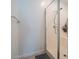 Clean shower with glass enclosure and storage shelf at 16543 W Alameda Rd, Surprise, AZ 85387