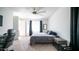 Comfortable bedroom with a king-size bed and access to en-suite bathroom at 16543 W Alameda Rd, Surprise, AZ 85387