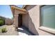 Side view of house entrance with landscaping at 16543 W Alameda Rd, Surprise, AZ 85387