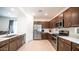 Modern kitchen with stainless steel appliances and light-colored cabinetry at 16543 W Alameda Rd, Surprise, AZ 85387