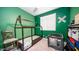 bedroom with toddler bed and play area at 16543 W Alameda Rd, Surprise, AZ 85387