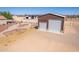 Detached storage shed with double doors, offering extra storage space at 3630 N 372Nd Ln, Tonopah, AZ 85354