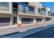 Modern townhouses with attached garages and private balconies at 142 E Hearne Way, Gilbert, AZ 85234