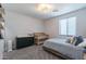 Cozy bedroom with a double bed, crib and dresser at 142 E Hearne Way, Gilbert, AZ 85234