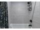 Bathroom with a shower/tub combo and floral shower curtain at 142 E Hearne Way, Gilbert, AZ 85234
