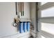Garage with water filter system and storage for cleaning supplies at 142 E Hearne Way, Gilbert, AZ 85234