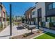 Outdoor patio with BBQ grill and seating area at 142 E Hearne Way, Gilbert, AZ 85234