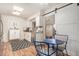 Modern kitchen with granite countertops and white cabinets at 14020 N Thunderbird Blvd, Sun City, AZ 85351