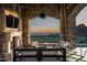 Relaxing patio with a fireplace and stunning mountain views at 11200 E Canyon Cross Way, Scottsdale, AZ 85255