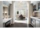 Spa-like bathroom with a large vanity, soaking tub and separate shower at 11200 E Canyon Cross Way, Scottsdale, AZ 85255