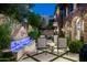 Tranquil courtyard with fountain, seating, and stone walls at 11200 E Canyon Cross Way, Scottsdale, AZ 85255