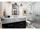Spa-like bathroom with marble vanity, designer lighting, and a walk-in shower at 11200 E Canyon Cross Way, Scottsdale, AZ 85255