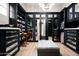 Spacious walk-in closet with custom built-ins and great lighting at 11200 E Canyon Cross Way, Scottsdale, AZ 85255