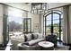 Living room with access to a patio and mountain views at 11200 E Canyon Cross Way, Scottsdale, AZ 85255
