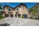 Three-car garage with paver driveway at 11200 E Canyon Cross Way, Scottsdale, AZ 85255