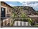 Balcony view of landscaped courtyard and mountain backdrop at 11200 E Canyon Cross Way, Scottsdale, AZ 85255