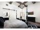 Bedroom with four-poster bed and en-suite bathroom at 11200 E Canyon Cross Way, Scottsdale, AZ 85255