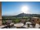 Outdoor patio with mountain views and comfortable seating at 11200 E Canyon Cross Way, Scottsdale, AZ 85255