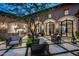 Elegant courtyard with seating areas and access to the interior at 11200 E Canyon Cross Way, Scottsdale, AZ 85255