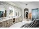 Bathroom with a large vanity, soaking tub and separate shower at 11200 E Canyon Cross Way, Scottsdale, AZ 85255