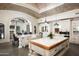 Open kitchen with two islands, custom cabinetry, and high-end appliances at 11200 E Canyon Cross Way, Scottsdale, AZ 85255
