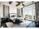 Bright bedroom with mountain views and a cozy sitting area at 11200 E Canyon Cross Way, Scottsdale, AZ 85255