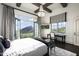 Spacious bedroom with mountain views and a sitting area at 11200 E Canyon Cross Way, Scottsdale, AZ 85255