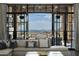 Living room with expansive windows showcasing mountain views at 11200 E Canyon Cross Way, Scottsdale, AZ 85255