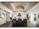 Gourmet kitchen boasts a large island, custom cabinetry, and brick vaulted ceilings at 11200 E Canyon Cross Way, Scottsdale, AZ 85255